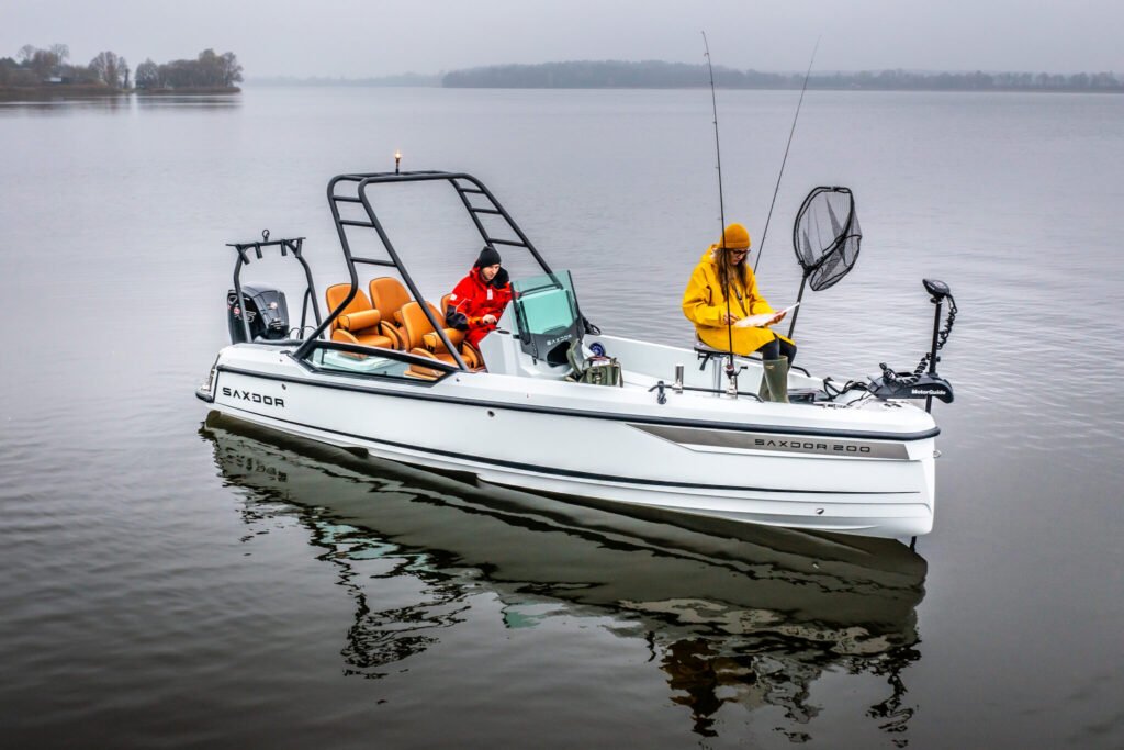 GRP yacht for sale, exterior on the water