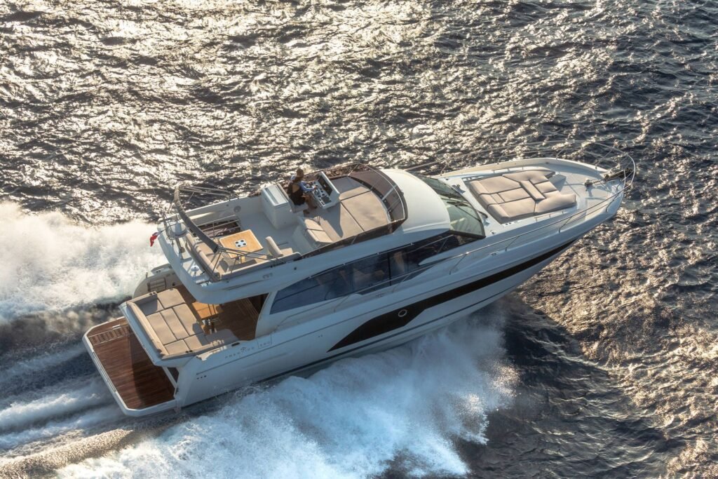 18 metre French planing hull yacht cruising coastal waters