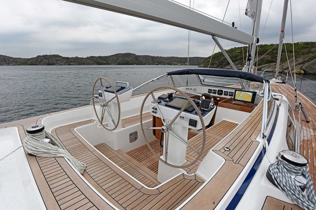 Swedish inboard sailing yacht for sale, exterior on the water