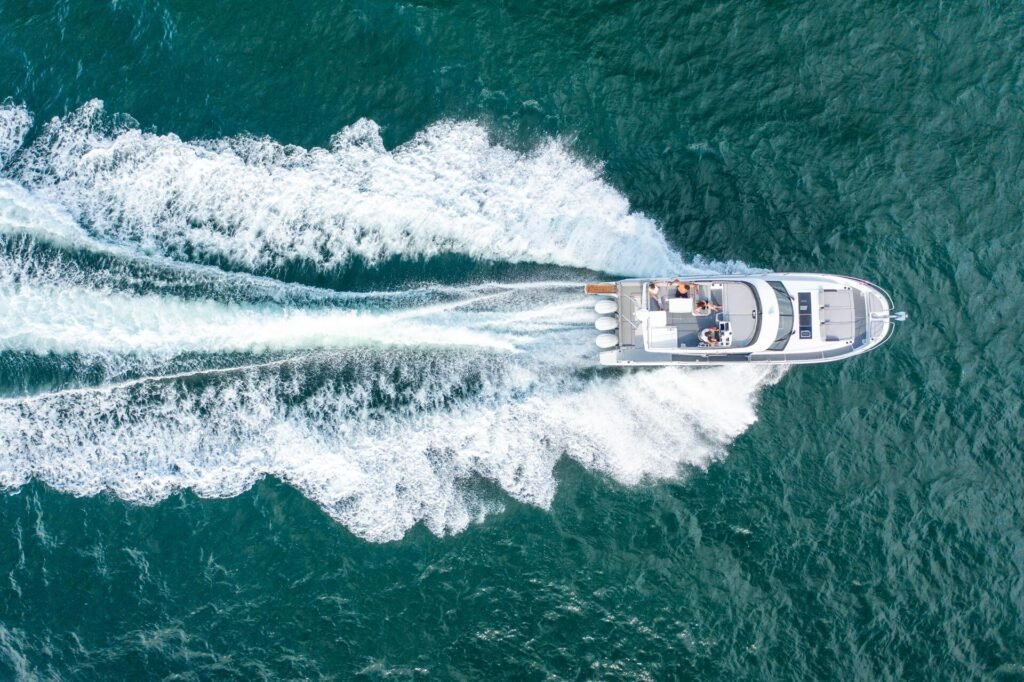13 metre 3 cabin planing yacht for sale, running at speed