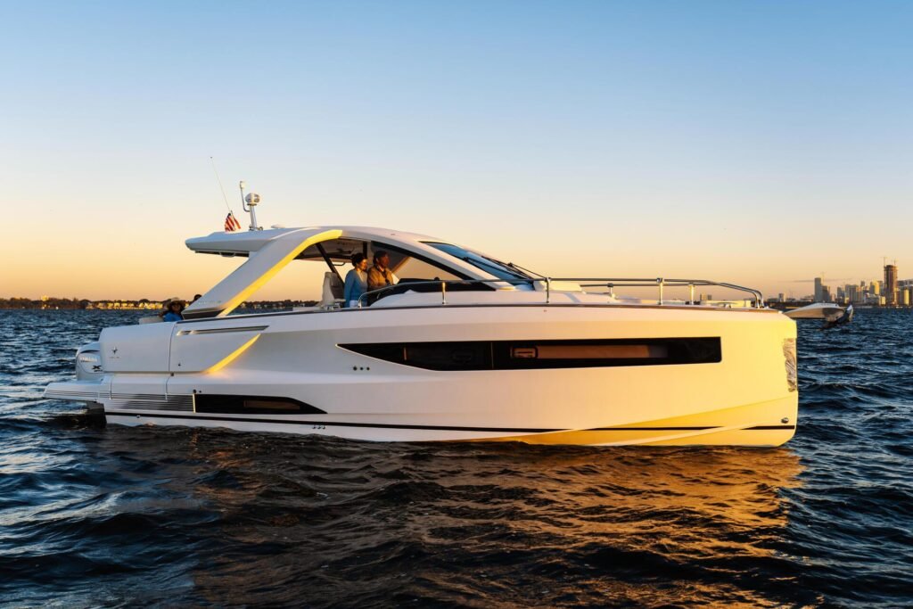 11 metre 8 guest outboard yacht for sale, running at speed