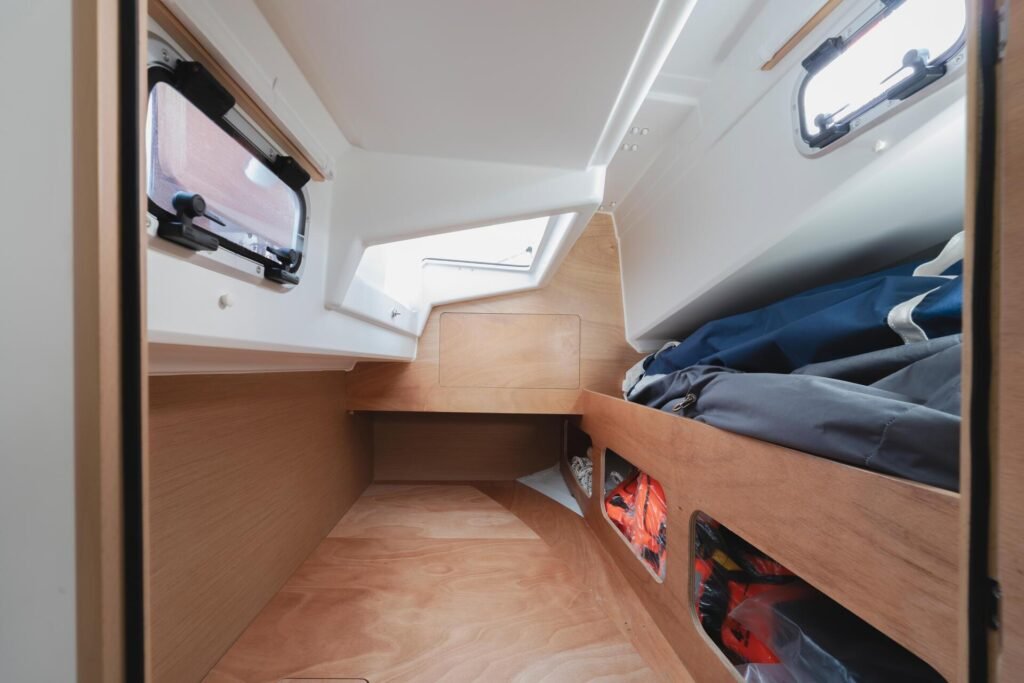 inboard sailing yacht around 100,000€ for sale, exterior on the water