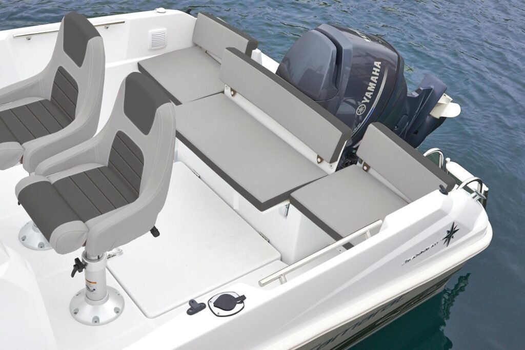 16 guest walkaround with planning hull anchored at a bay