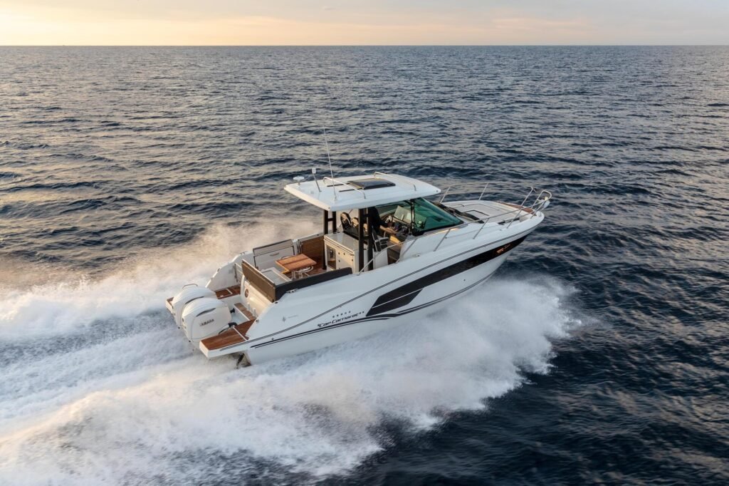 11 metre planning walkaround yacht at anchor in calm bay