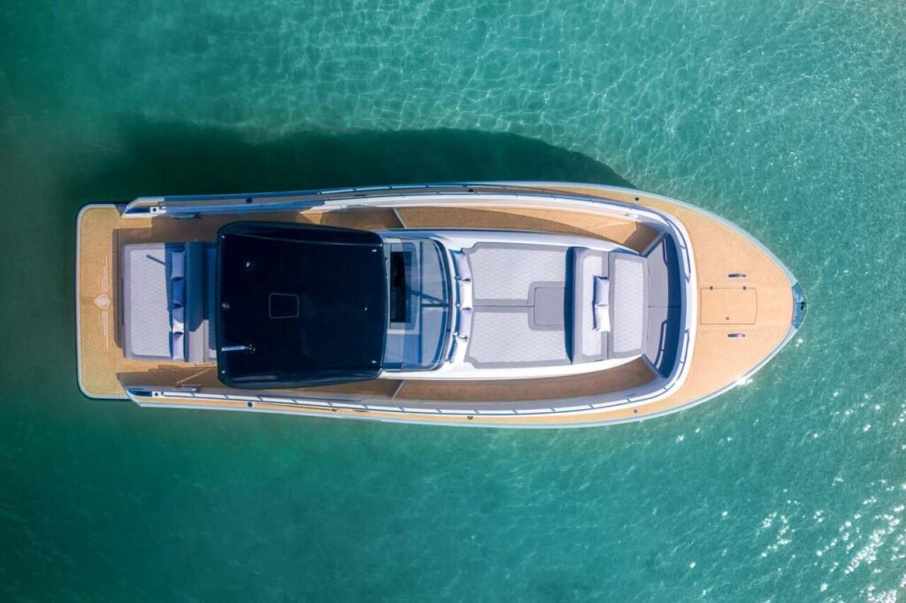 14 metre walkaround yacht at anchor showing full deck access