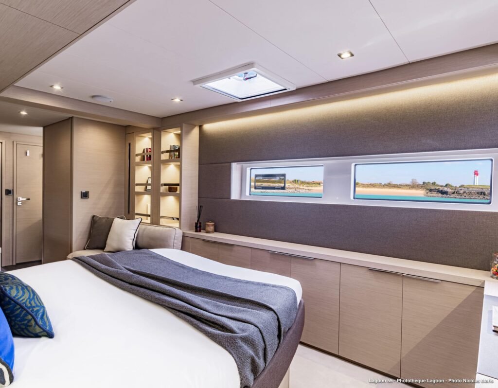 16m sailing catamaran under sail, twin hull profile