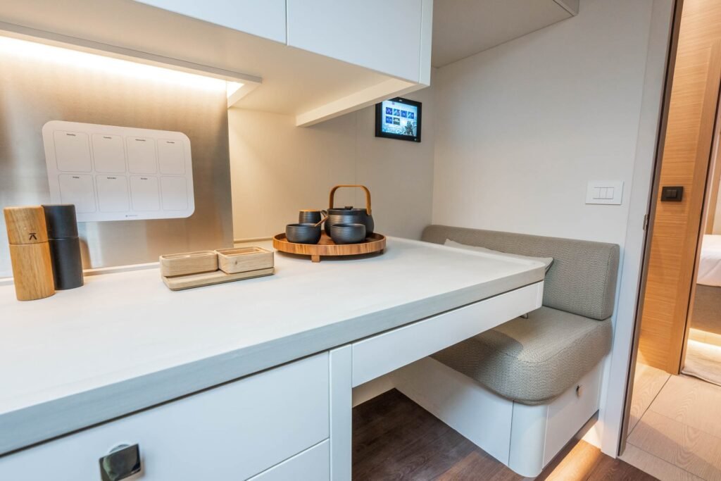 luxury sailing catamaran under way with sails set