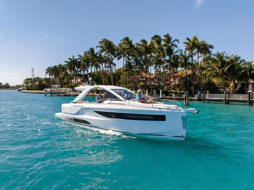 11 metre 8 guest outboard yacht for sale, stern view at anchor