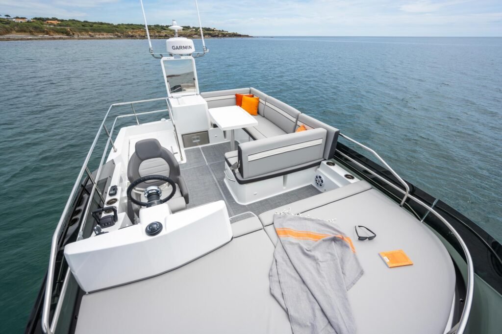13 metre planing 3 cabin yacht at a coastal anchorage