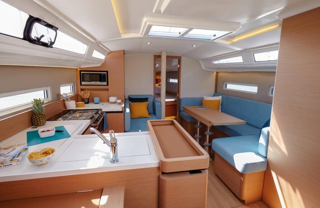 French monohull with 2 cabins anchored in turquoise bay