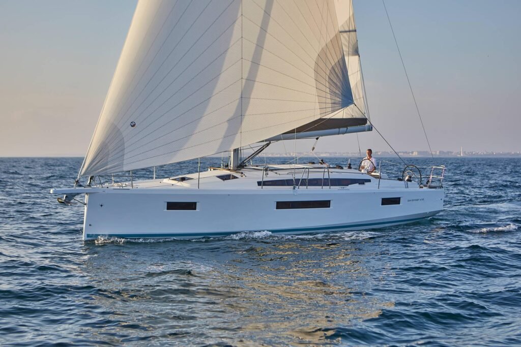 2 cabin inboard French yacht underway on coastal waters