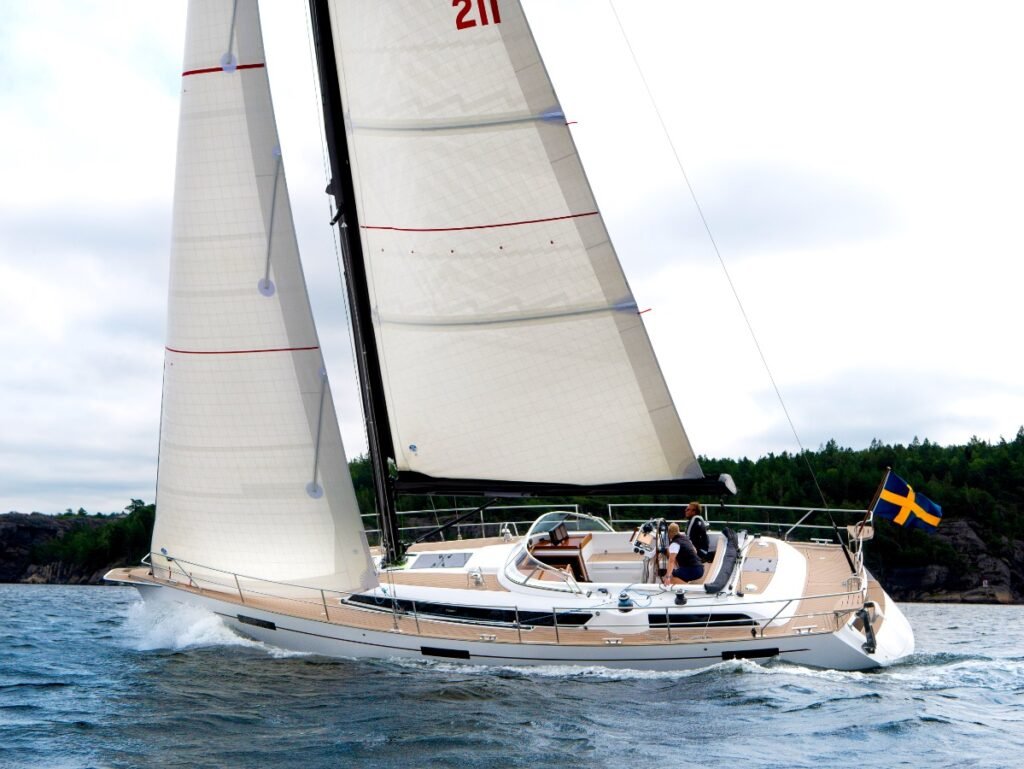 luxury displacement yacht at peaceful anchorage showing graceful lines