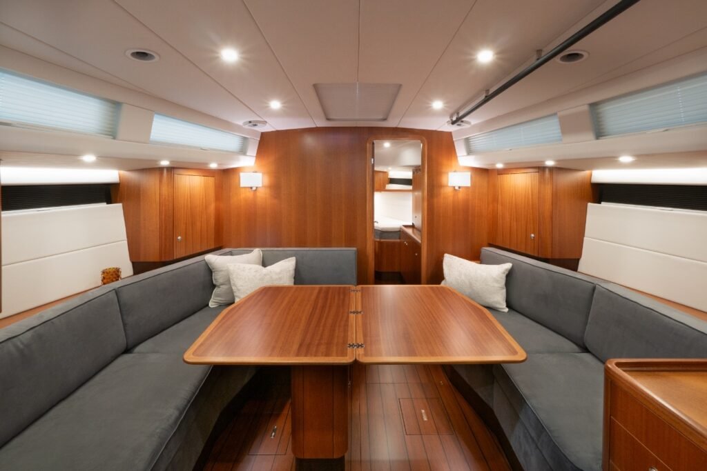 two cabin sailing yacht under way, sails set
