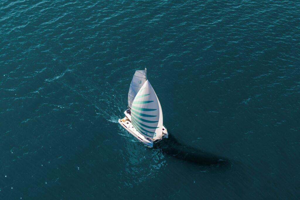 2 cabin luxury catamaran for sale, sailing with twin hulls visible