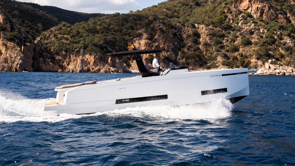 10 metre 2 cabin Spanish built yacht for sale, at anchor in cove