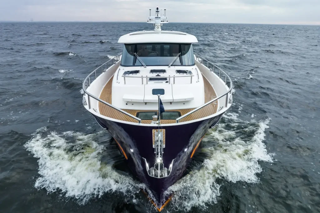 16 metre Dutch steel vessel at anchor showing robust hull lines