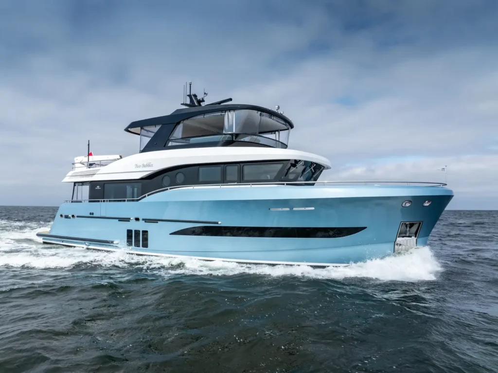 22 metre 4 cabin explorer yacht at anchor in calm waters