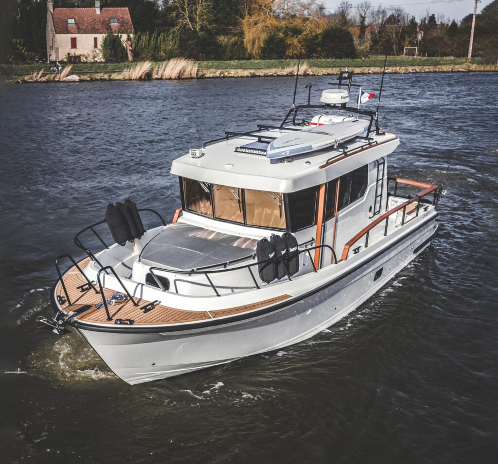 Finnish luxury yacht with 2 cabins cruising at sunset