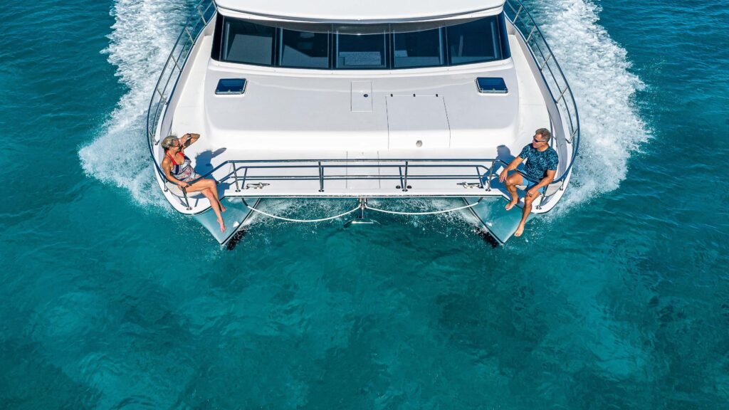 18 metre 4 cabin planing yacht for sale, at anchor in calm waters