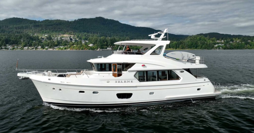 20 metre inboard semi-displacement yacht for sale, exterior on the water