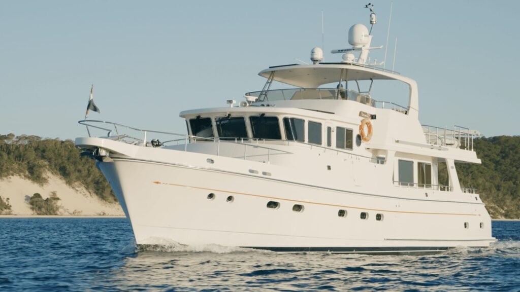 semi displacement trawler yacht for sale, cruising on open water
