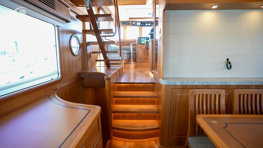 12 guest Chinese trawler yacht at anchor, pilothouse and deck