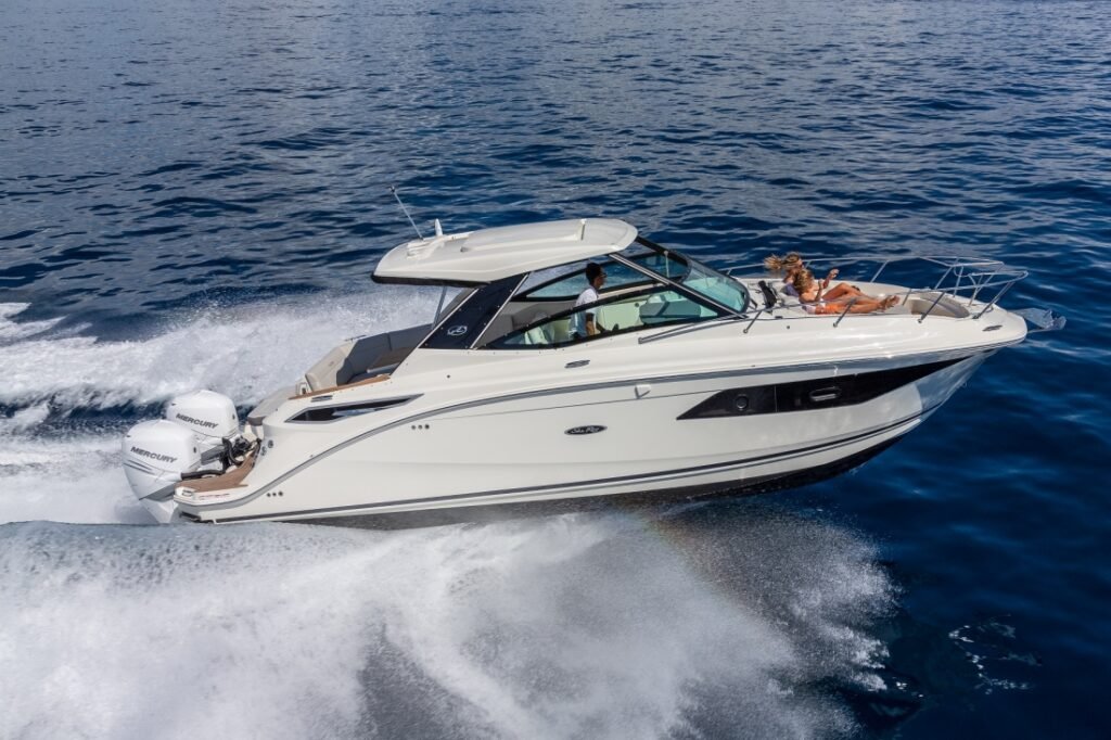11 metre GRP luxury yacht for sale, profile on calm water