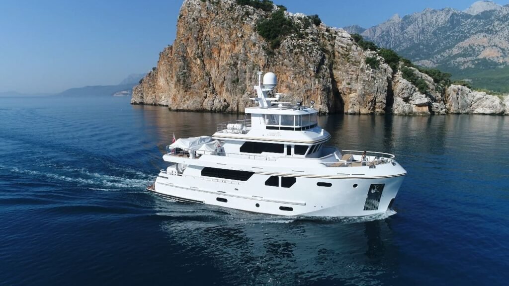 aluminium semi displacement yacht at anchor