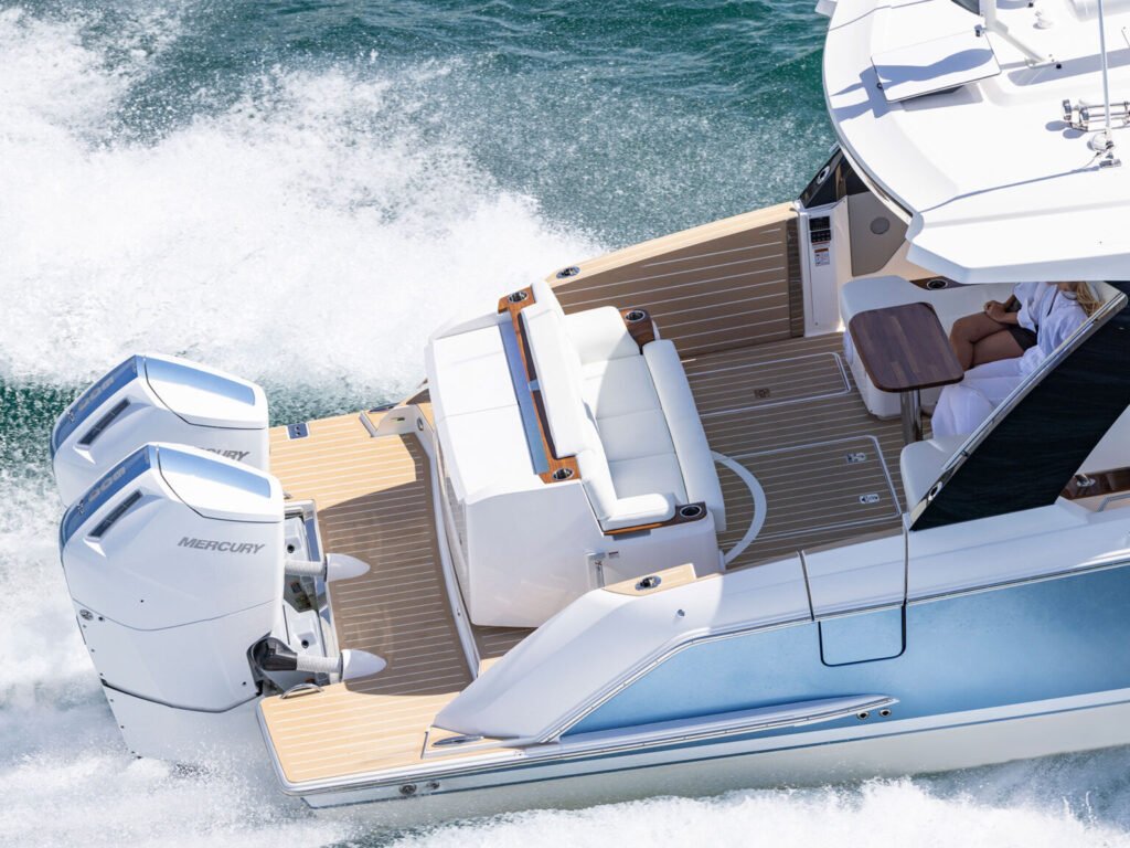 12 metre outboard planning yacht for sale, at anchor in calm seas