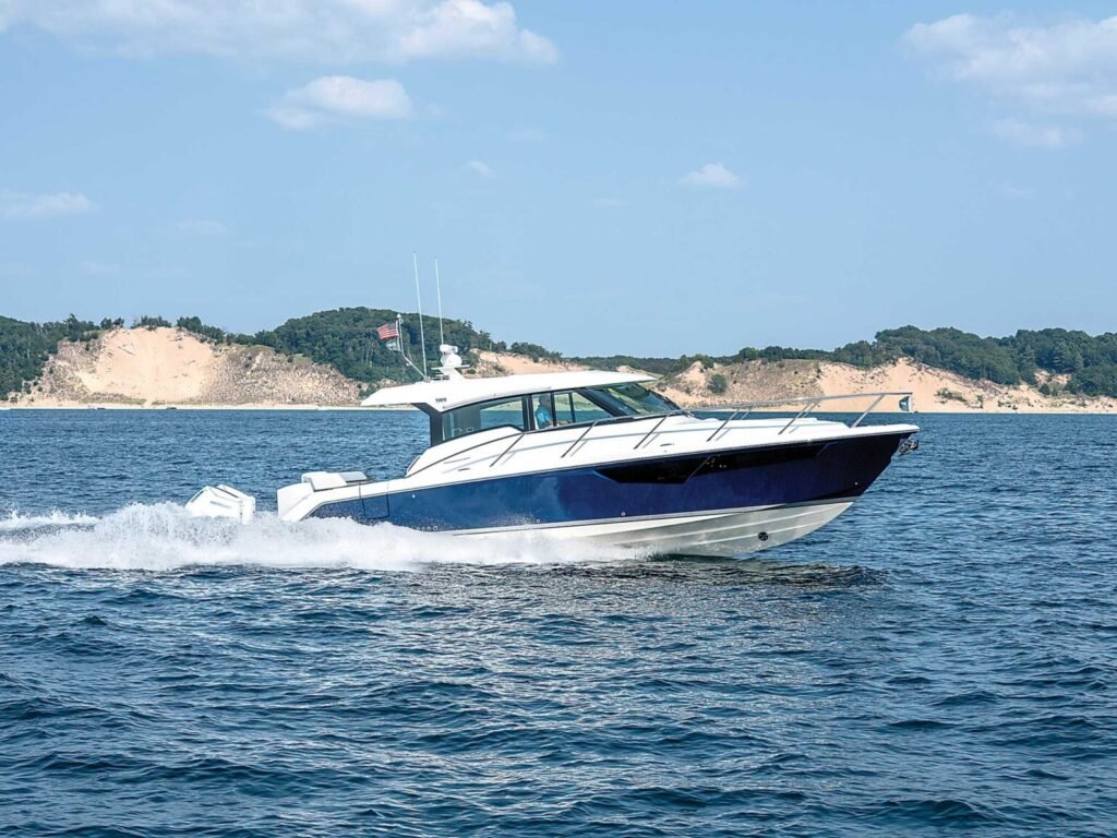 2 cabin luxury yacht around 900,000 euros, at sea in golden light