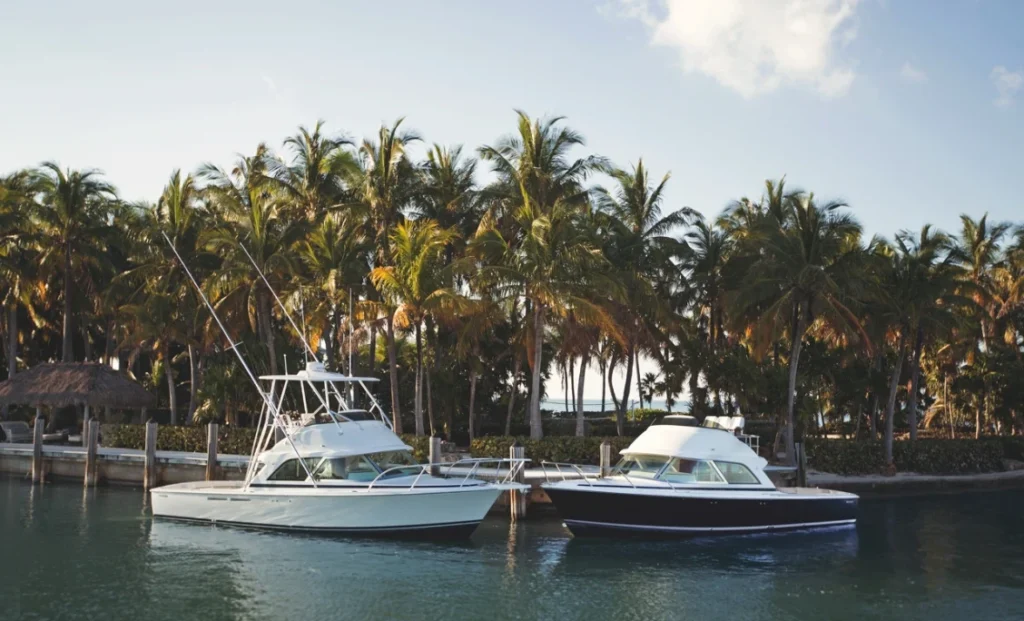 11 metre flybridge yacht with 2 cabins at anchor