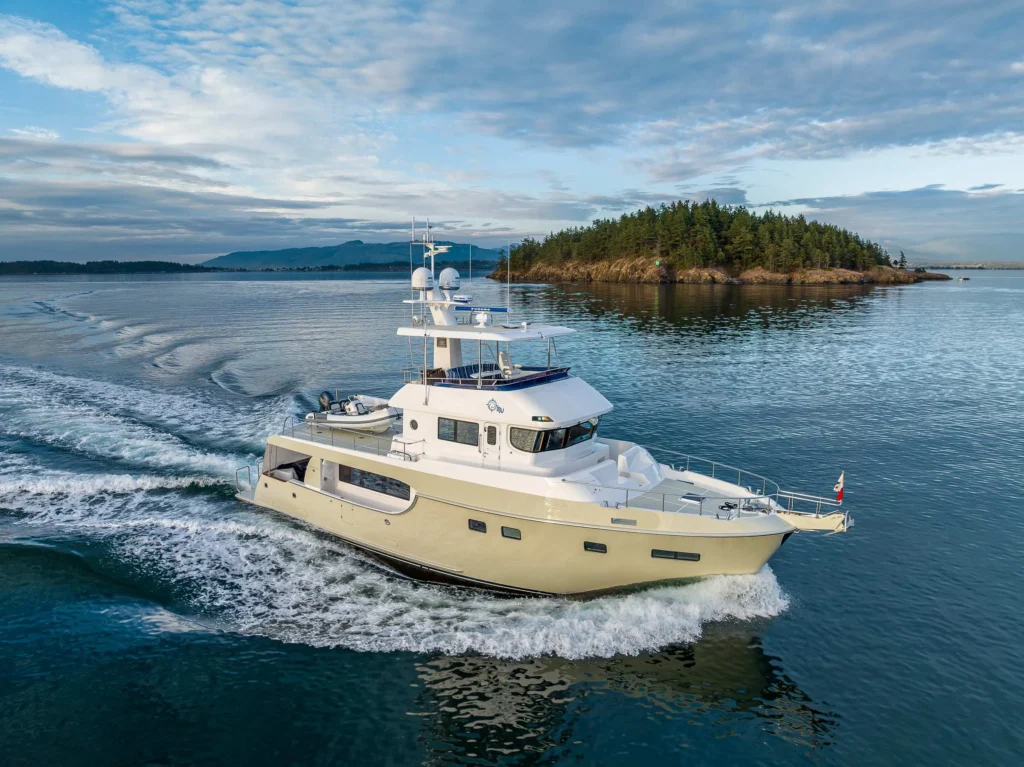 16 guest displacement explorer yacht for sale, underway at sea