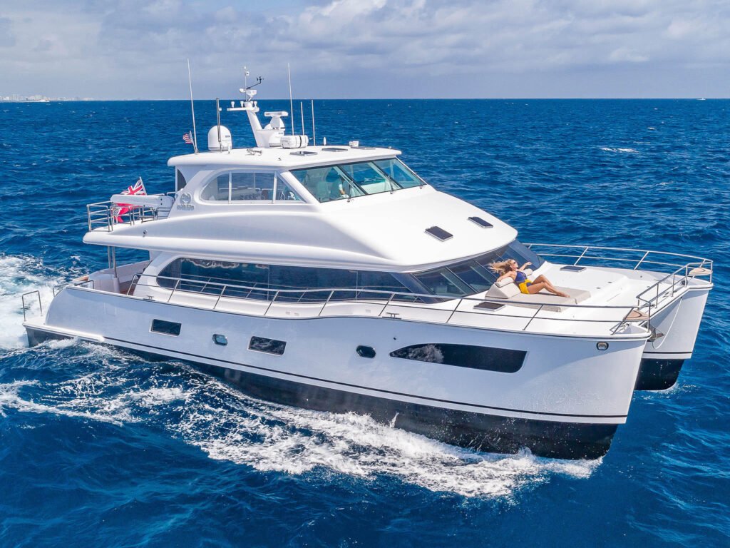 18 metre 8 guest catamaran for sale, twin-hull profile at sea