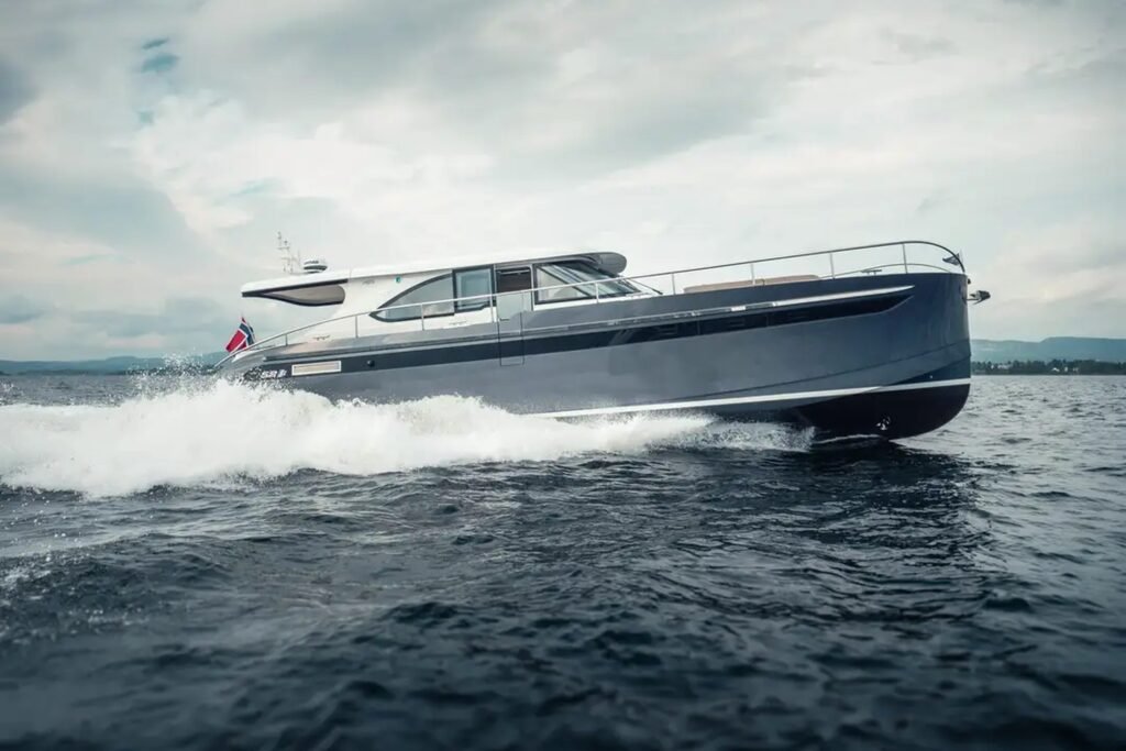 Netherlands built planning hull yacht at anchor
