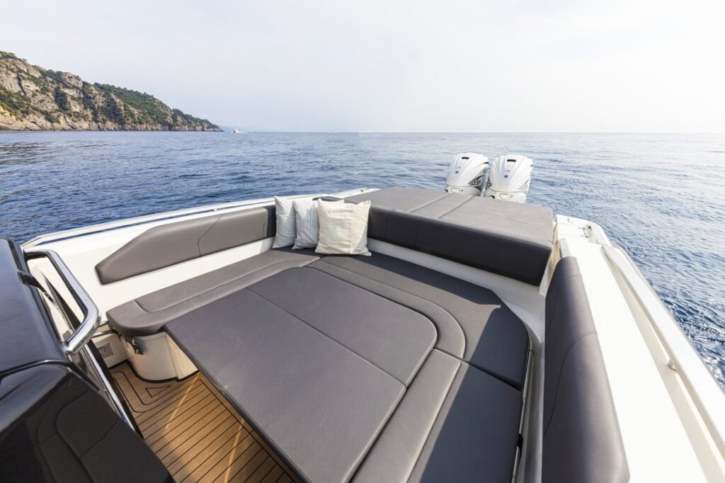 12 metre Italian planning hull yacht for sale, at anchor in calm seas