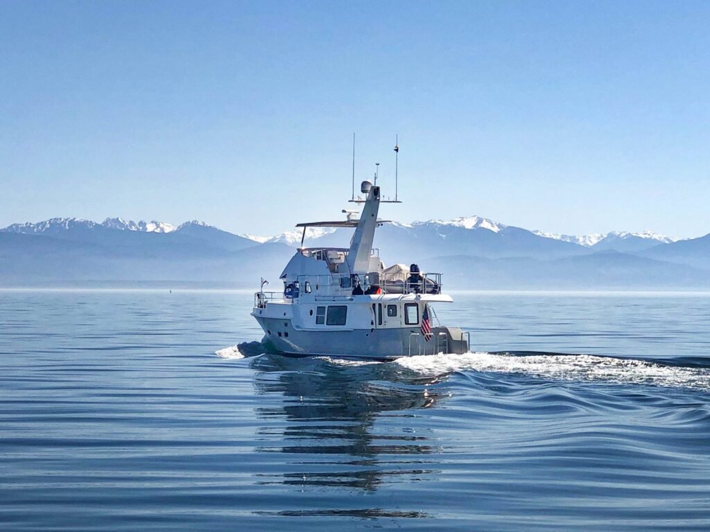 16 guest semi displacement trawler yacht for sale, at sea