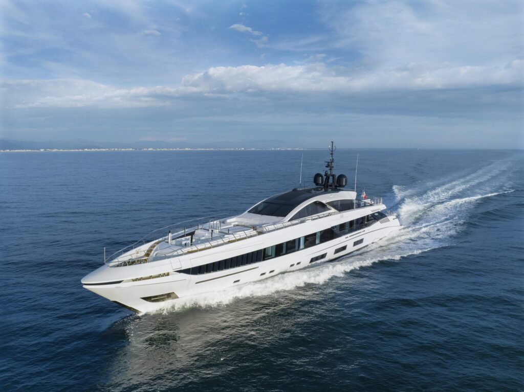 Fast displacement monohull yacht at anchor, side profile