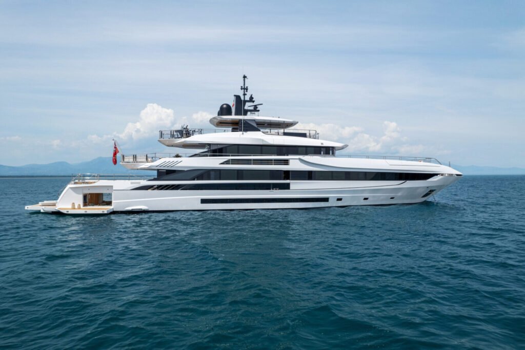 12 guest Italian steel yacht for sale, exterior on the water