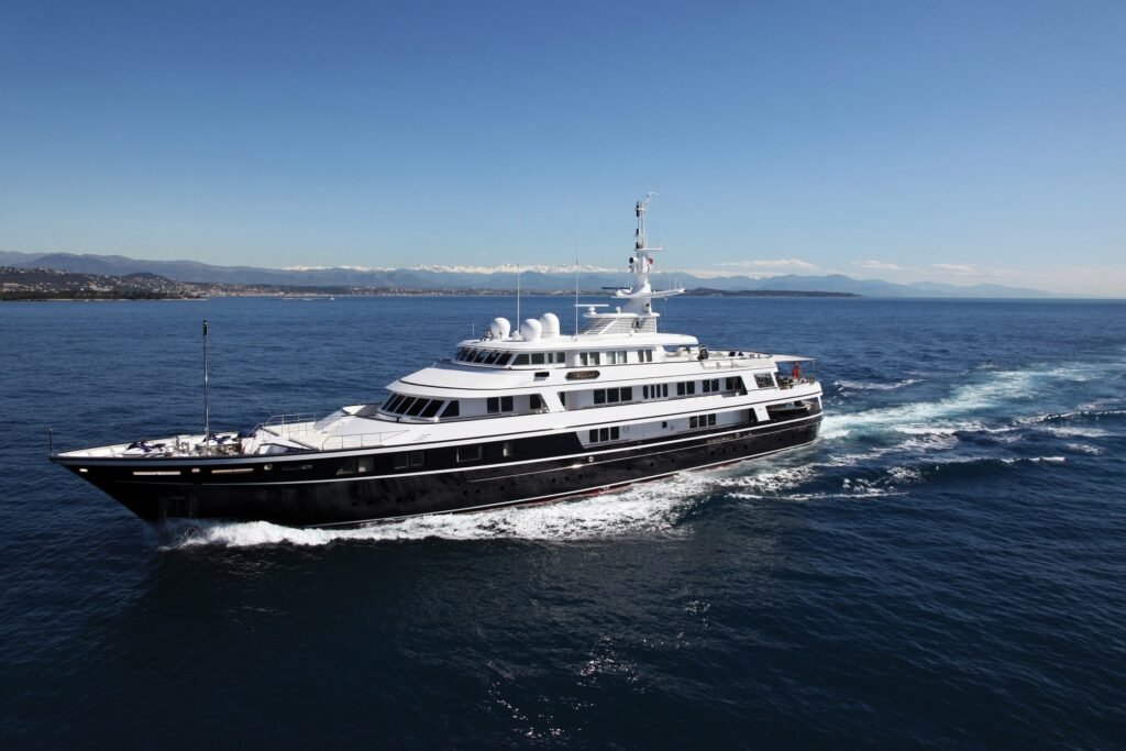 Feadship yacht charter, exterior profile at sea