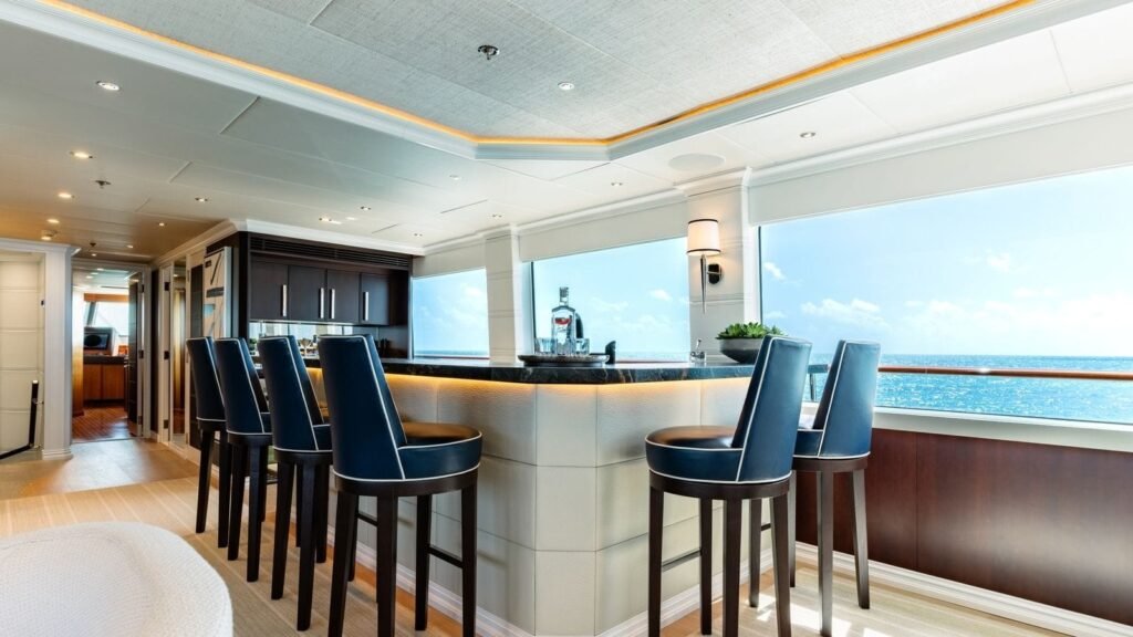 Bar with barstools and a sea view