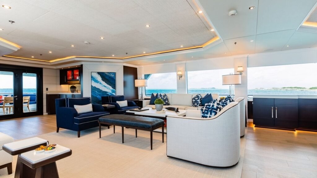 Main saloon lounge with navy armchairs