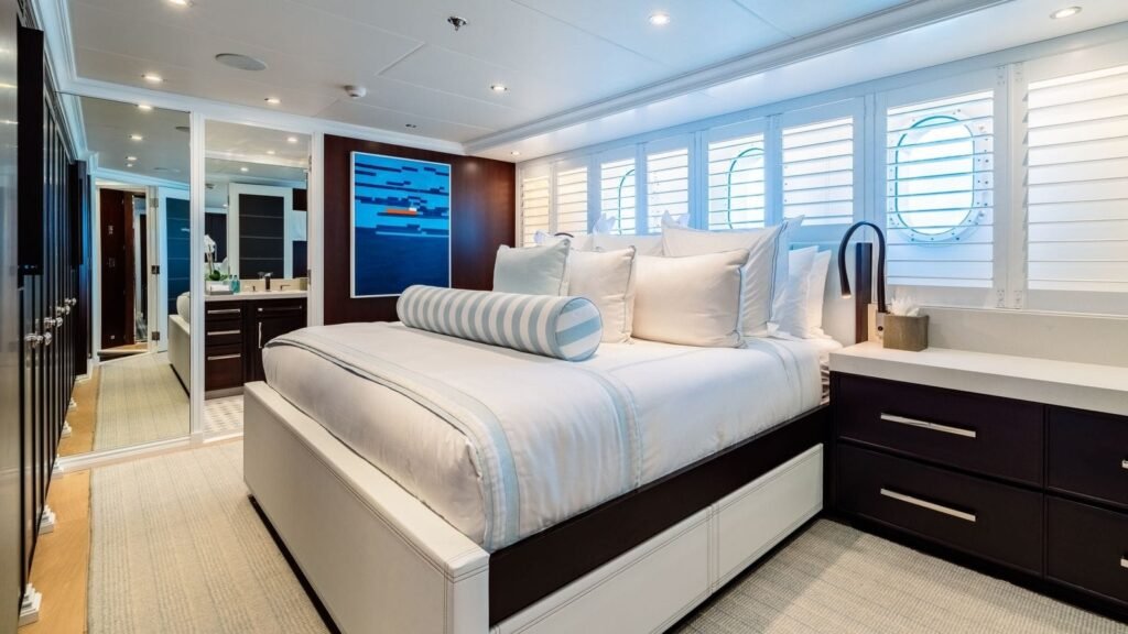 Guest stateroom with a blue abstract artwork