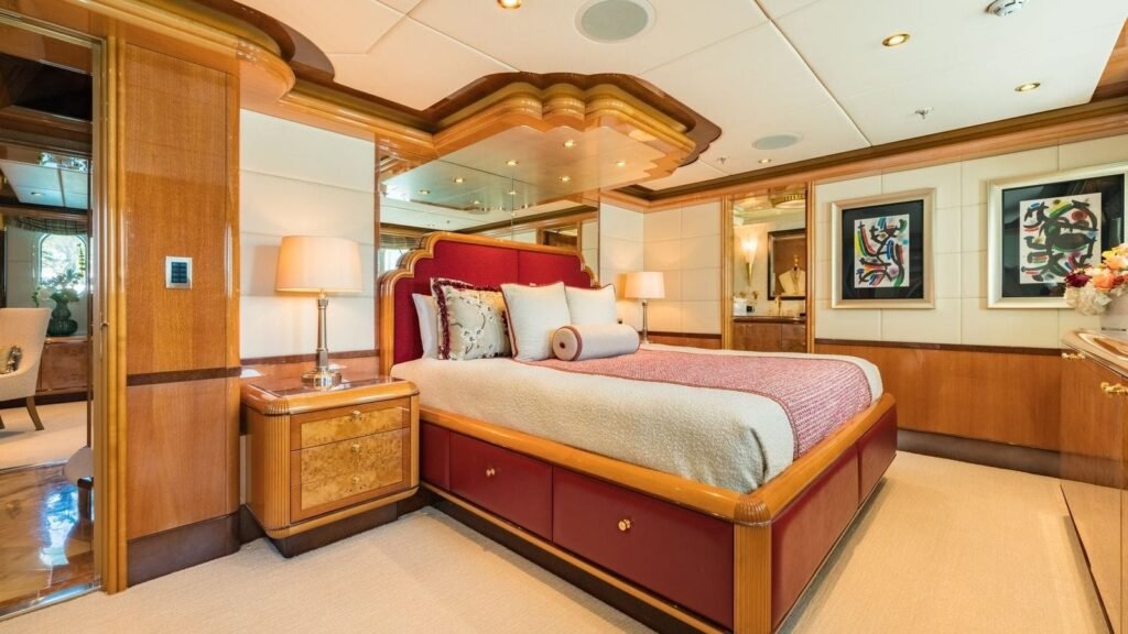 Stateroom in burgundy and cream tones