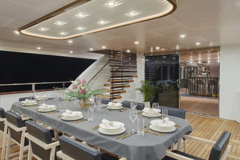 12 guest charter sailing yacht, aft deck at anchor
