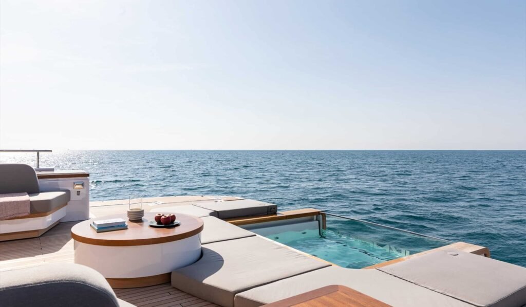 Benetti Oasis 34M yacht for sale - aft infinity pool and beach club of the 34m Benetti superyacht