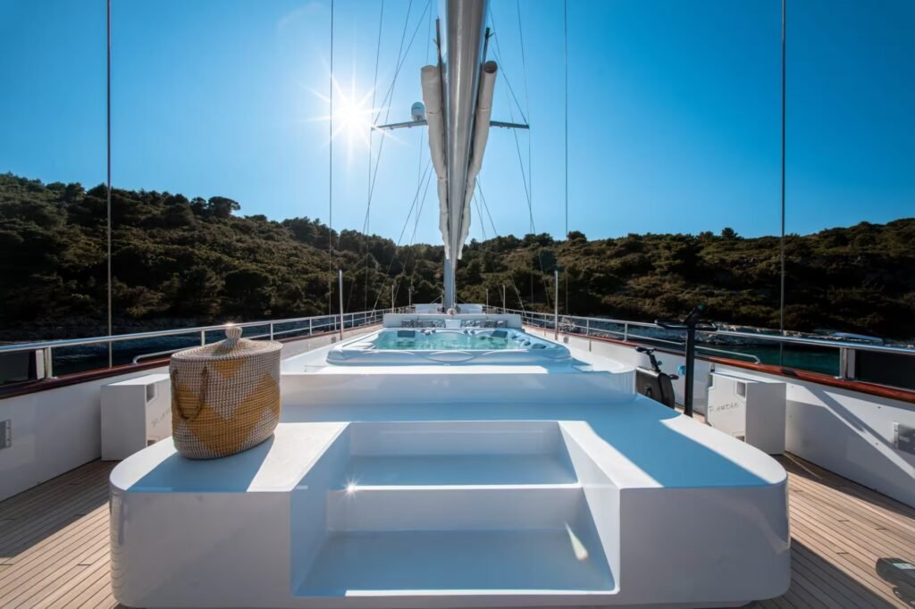 Six cabin sailing charter yacht, under sail at sea