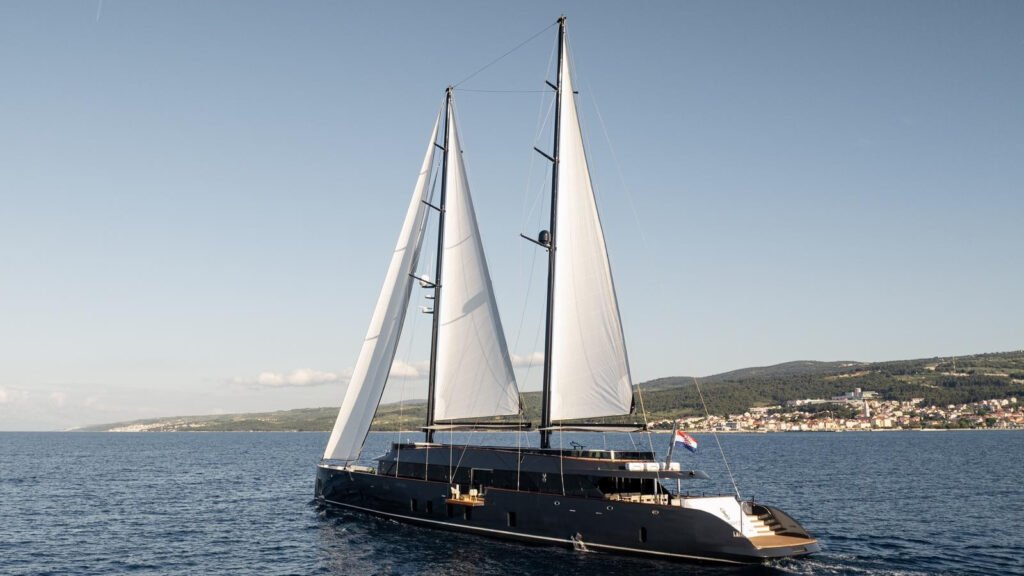Hvar sailing charter yacht, cockpit dining at anchor