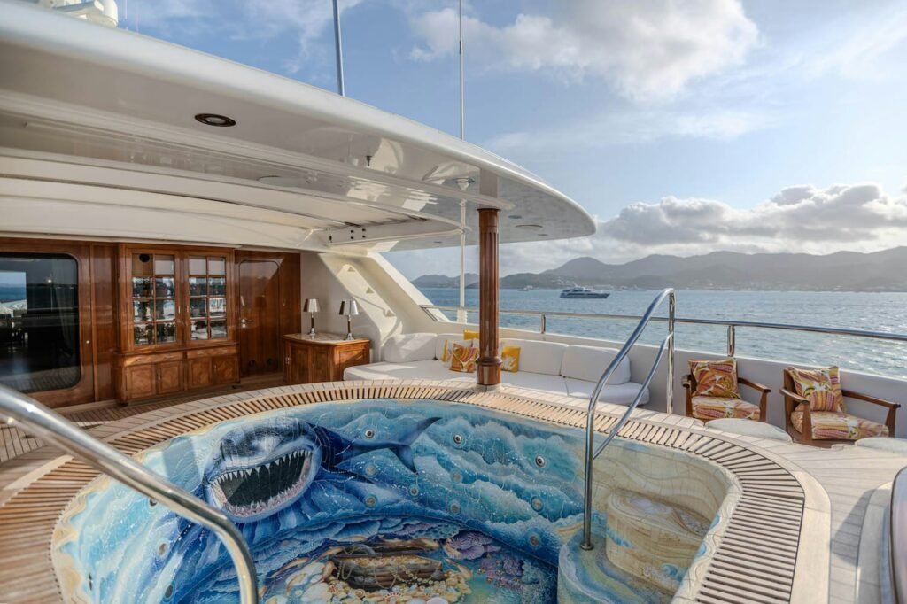 charter yacht at 450,000 euros per week, exterior profile at anchor