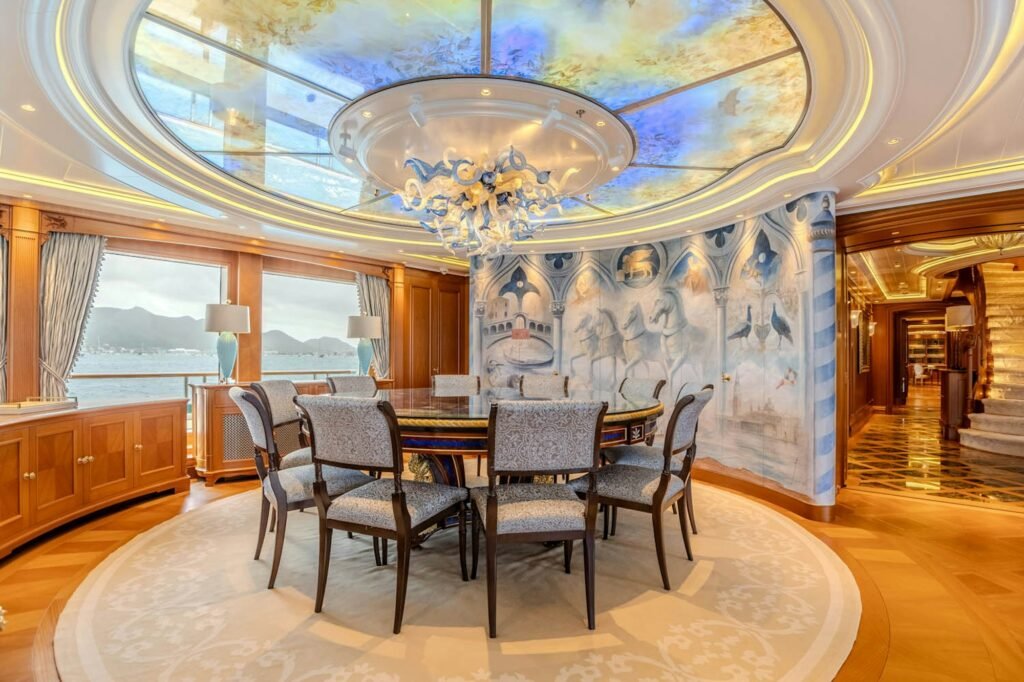 SEA OWL dining under Chihuly chandelier