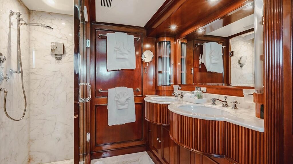 Master bathroom with marble shower and his-and-hers vanity